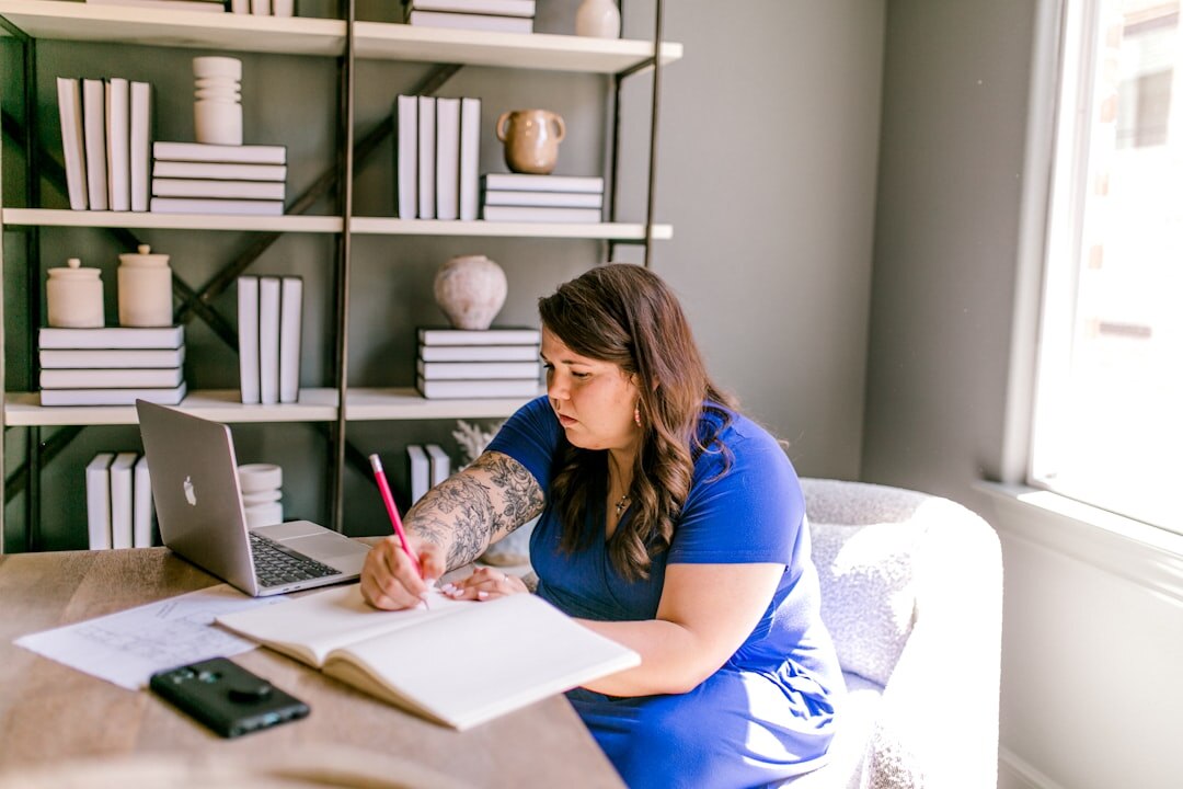 woman journaling at desk