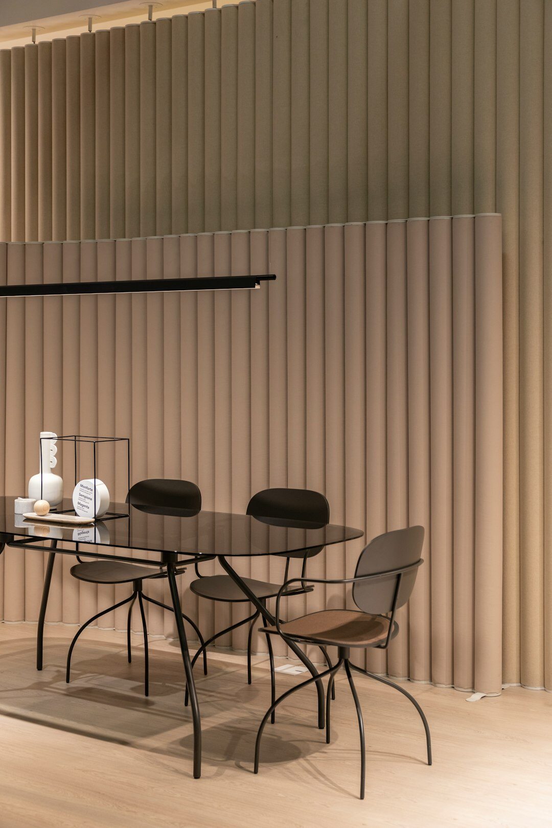 Small meeting room with a round table and soft lighting
