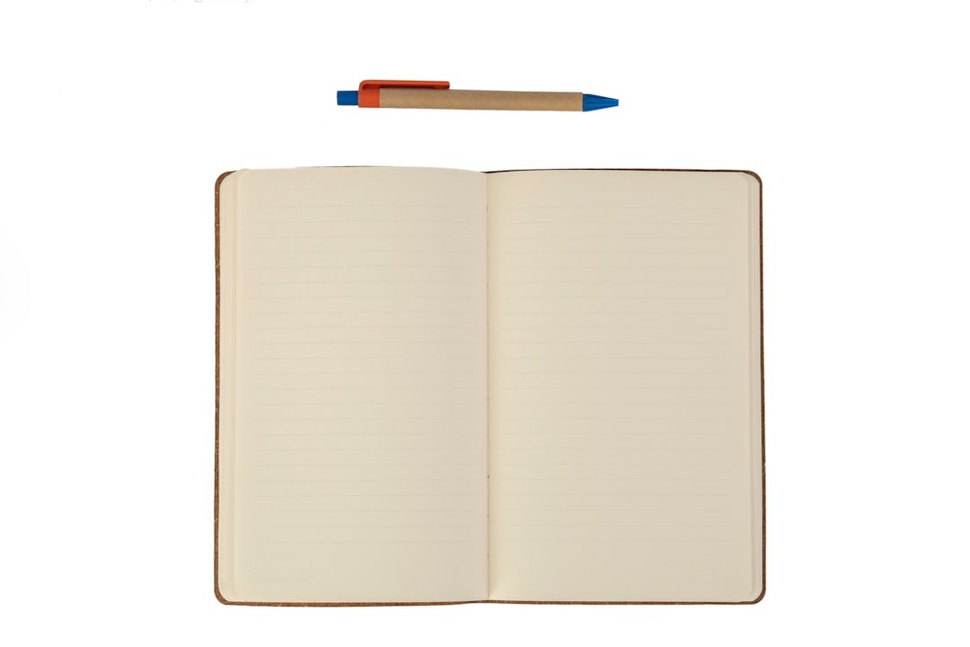 open journal with pen