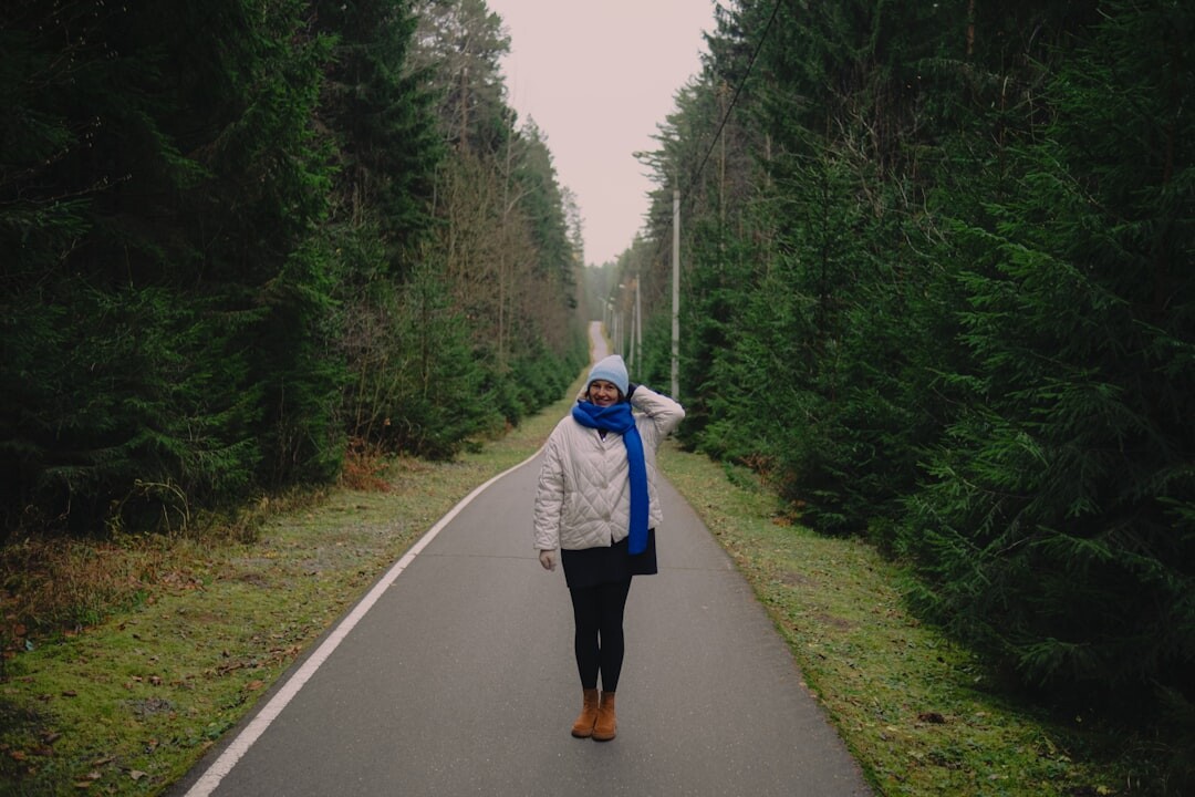 person walking in peaceful forest